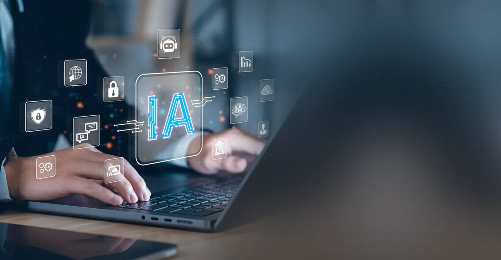 Hands on a laptop with business technology icons